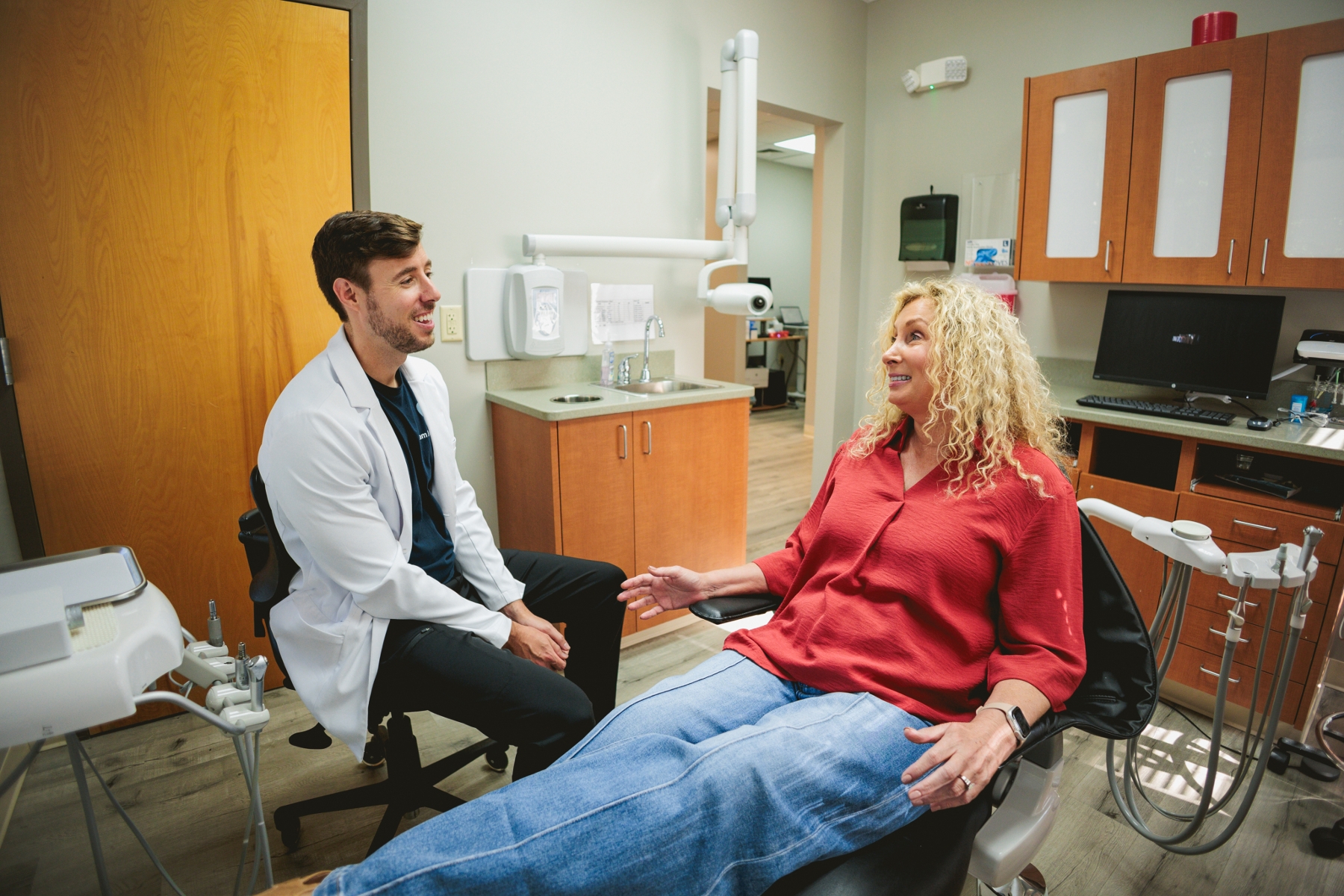 Dr. Bowers talking to patient