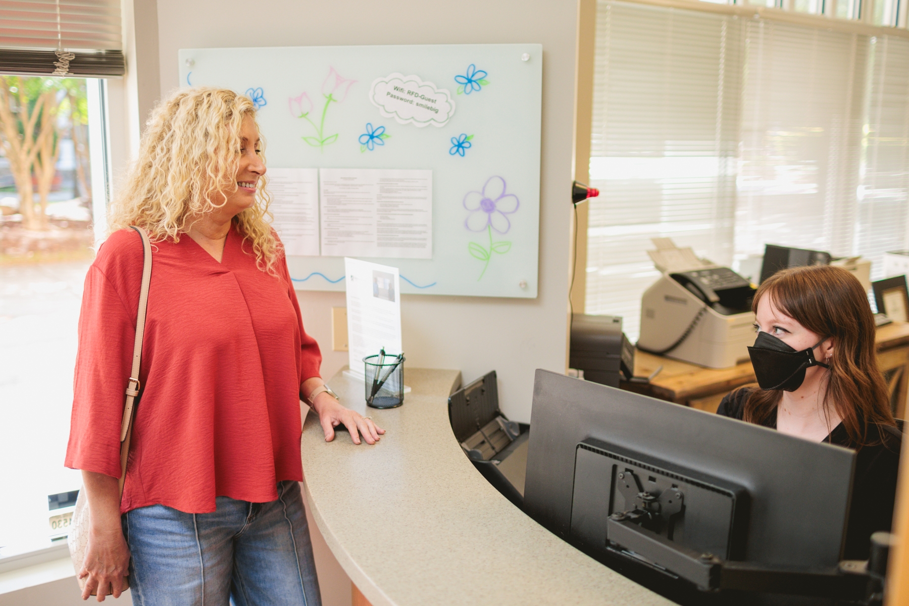 Patient checking in at front desk
