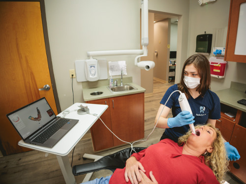 Patient receiving digital intraoral scan